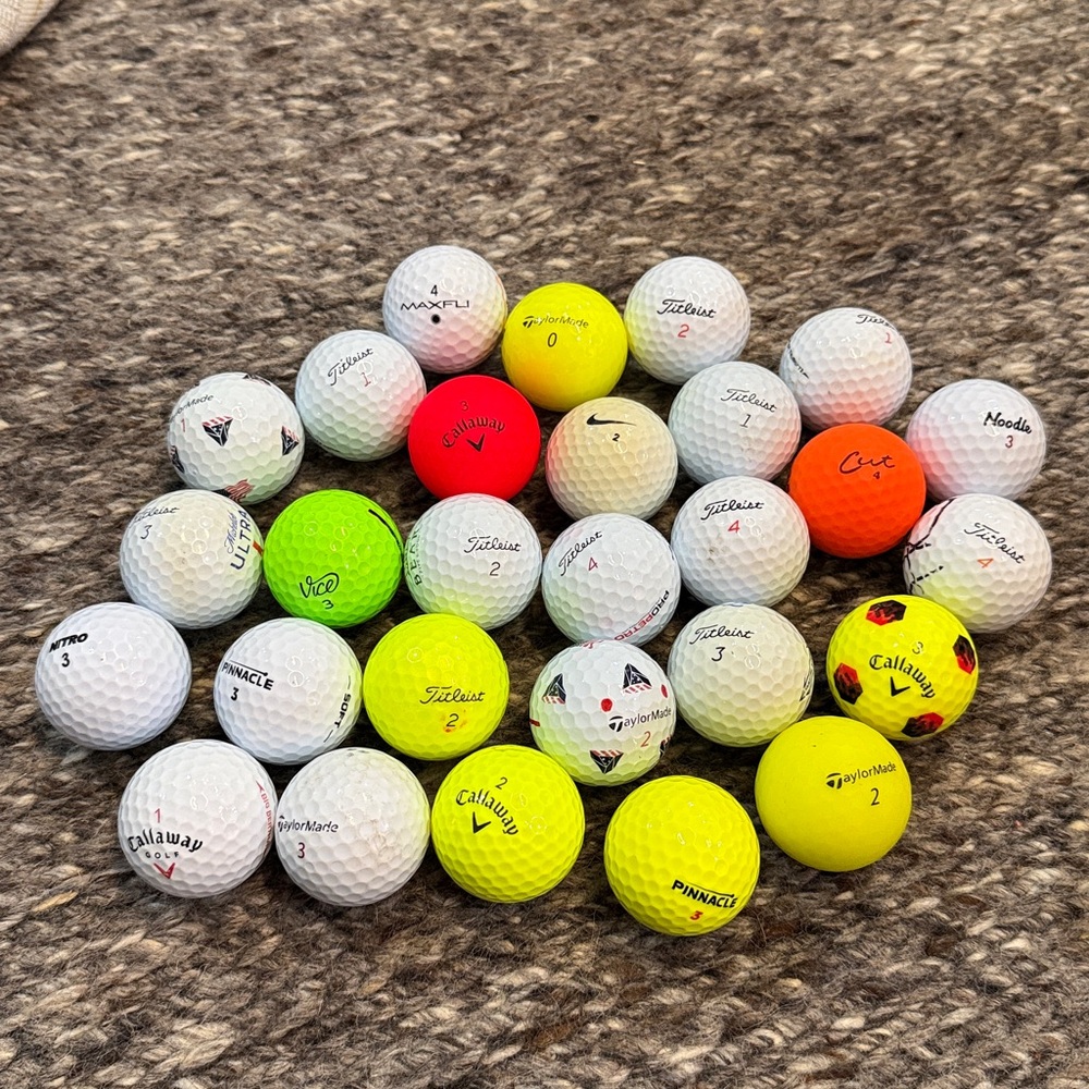 28 Used Golf Balls